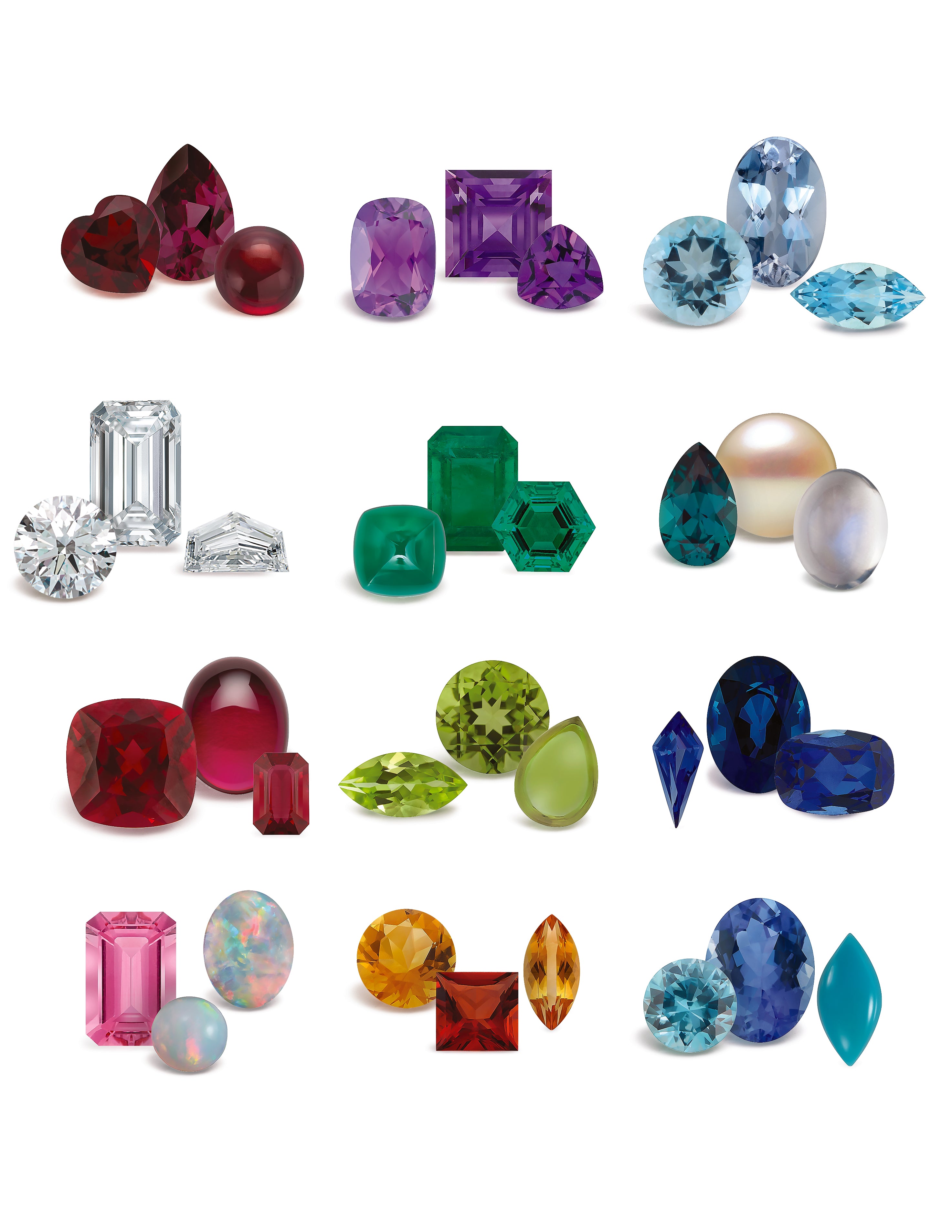 Collection of various colorful gemstones on a white background
