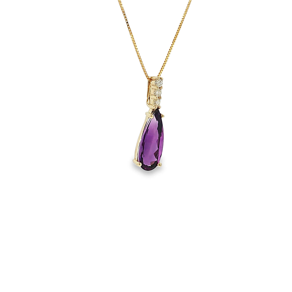 14K yellow gold drop pendant with a pear-shaped purple amethyst and three round diamond accents.