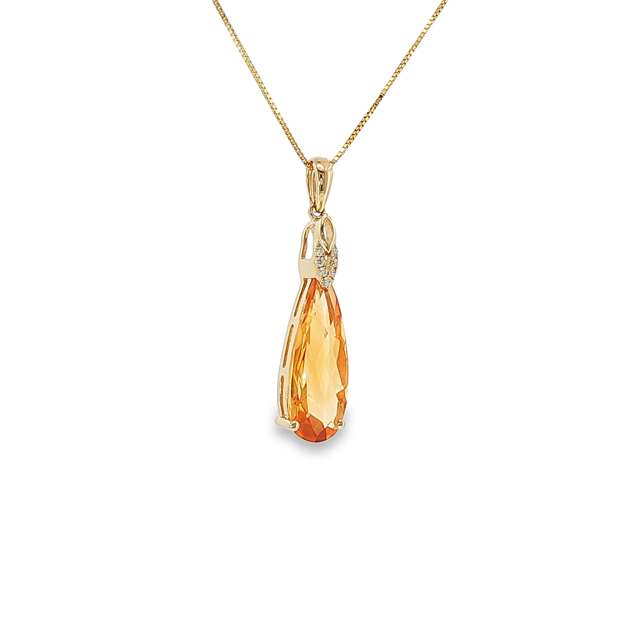 14K yellow gold pendant with a pear-shaped golden citrine and seven diamond accents.