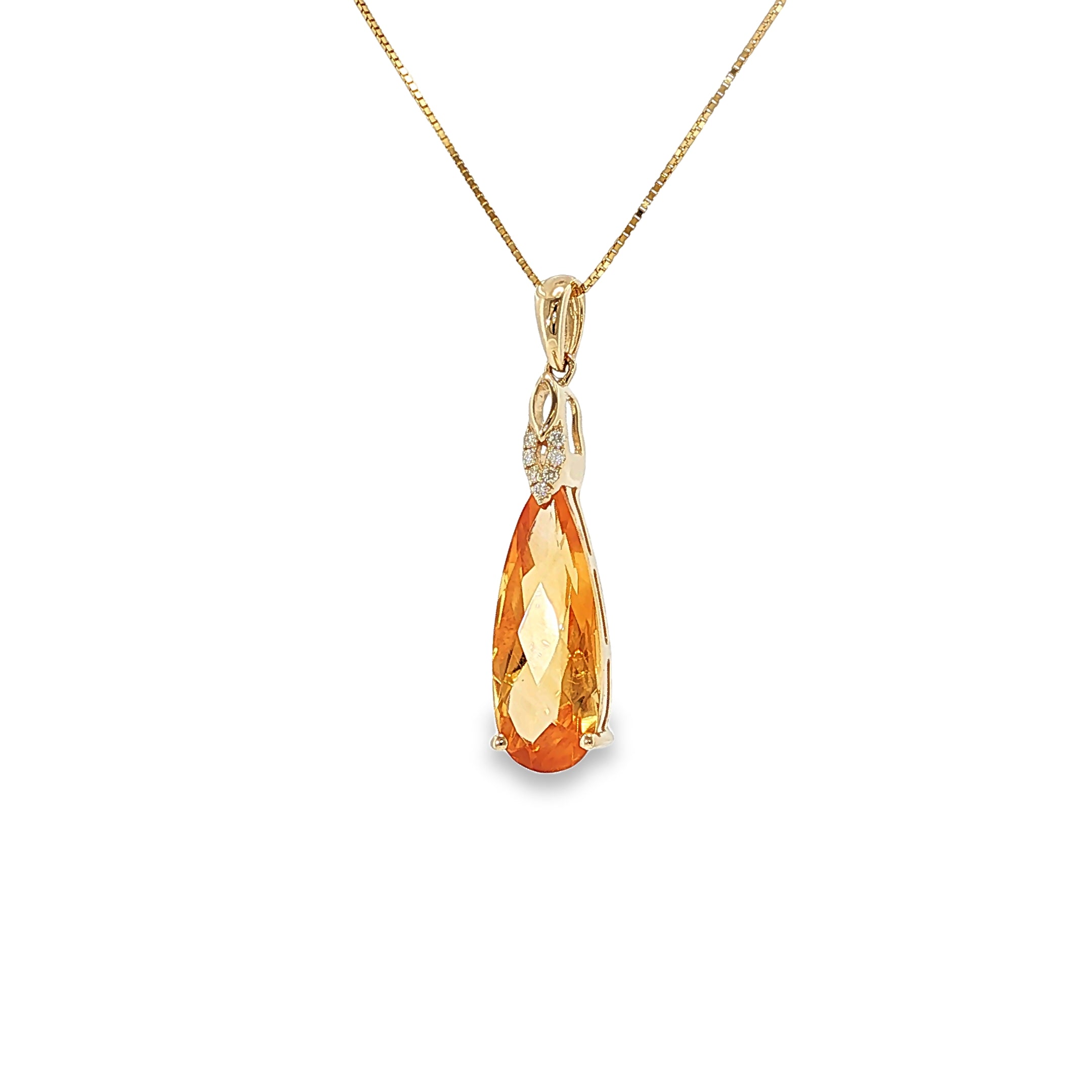 14K yellow gold pendant with a pear-shaped golden citrine and seven diamond accents.