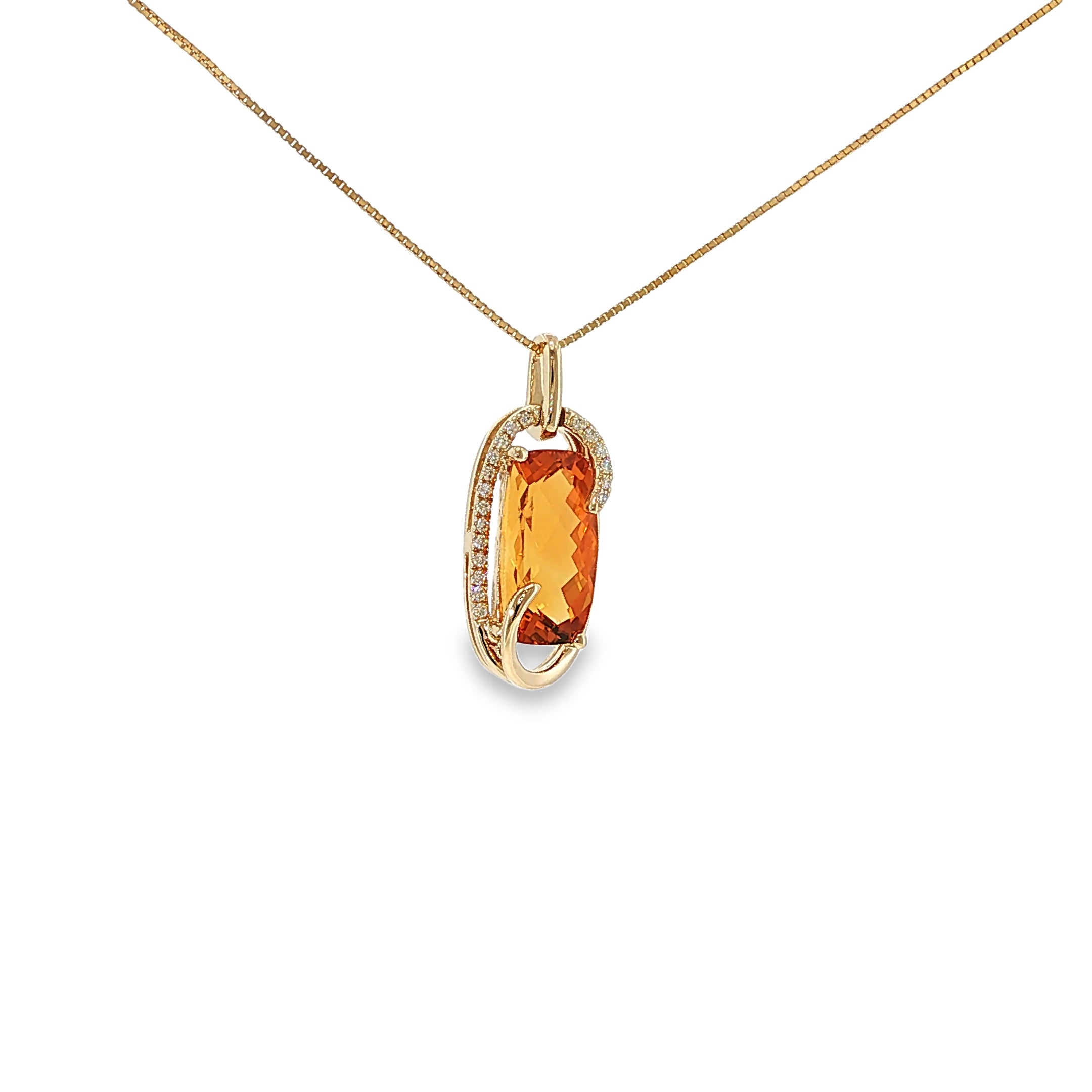 14K yellow gold pendant with an elongated golden-orange citrine framed by sweeping curves and diamond accents.