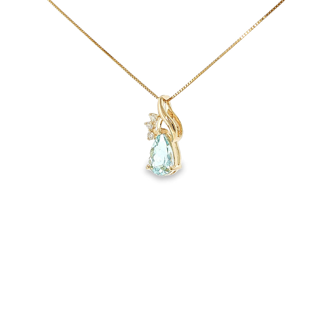 14K yellow gold swirl pendant with a pear-shaped pale blue aquamarine and three diamond accents.