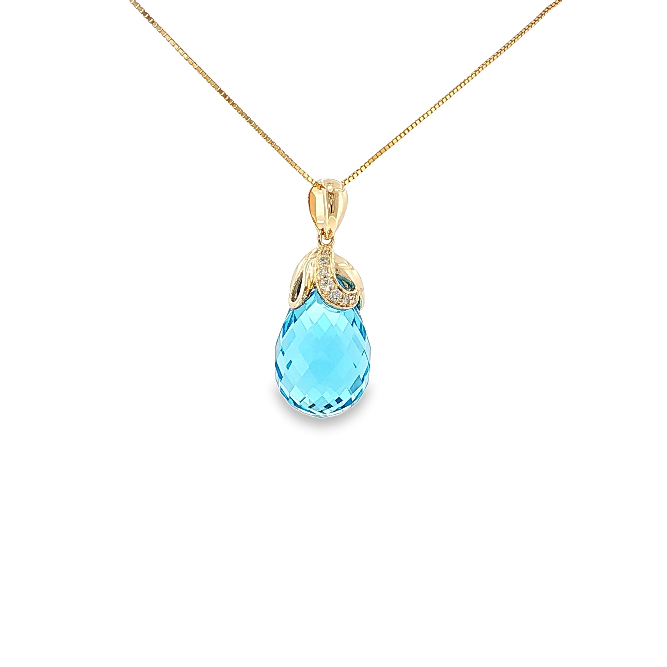 14K yellow gold drop pendant with a faceted Swiss blue topaz briolette and ornate gold cap.