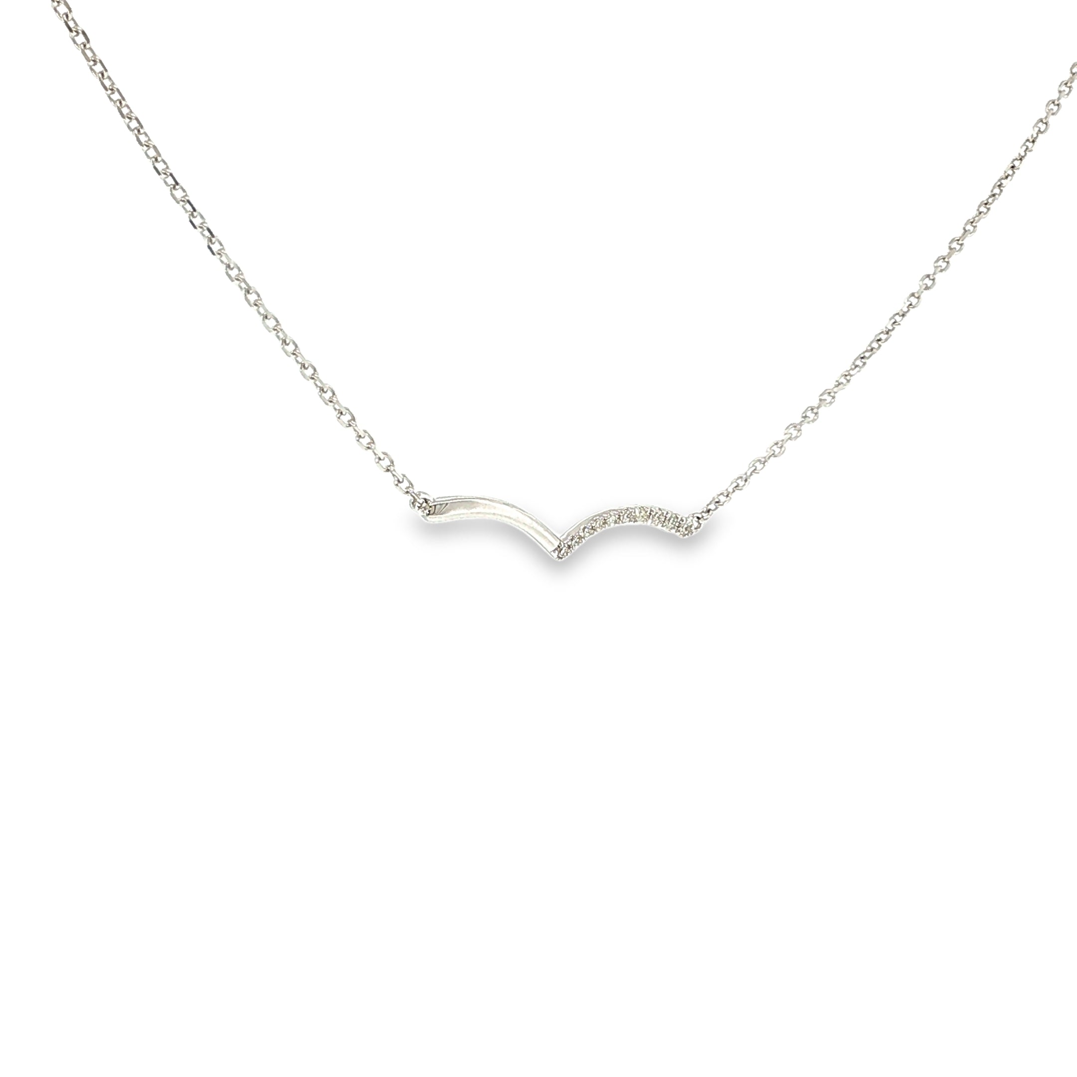 14K white gold asymmetrical wave necklace with a flowing polished design and a row of diamond accents.