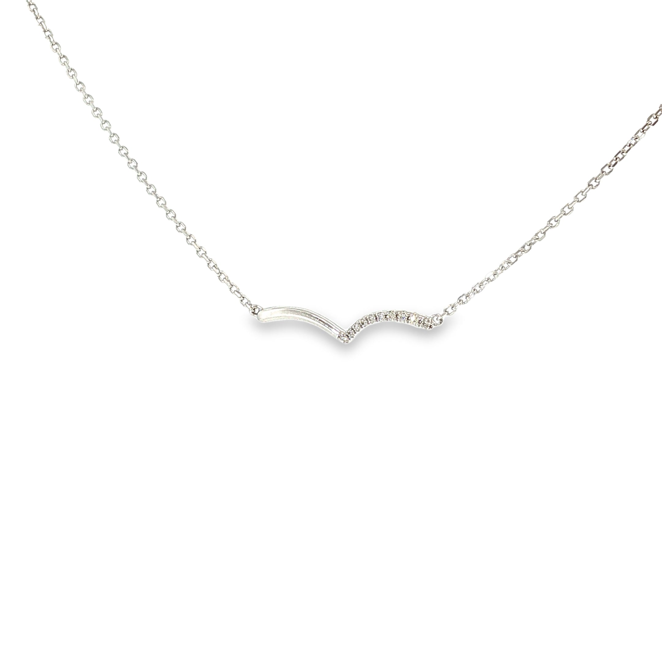14K white gold asymmetrical wave necklace with a flowing polished design and a row of diamond accents.