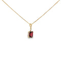 14K yellow gold pendant with a checkerboard-cut deep red garnet and a single diamond accent.