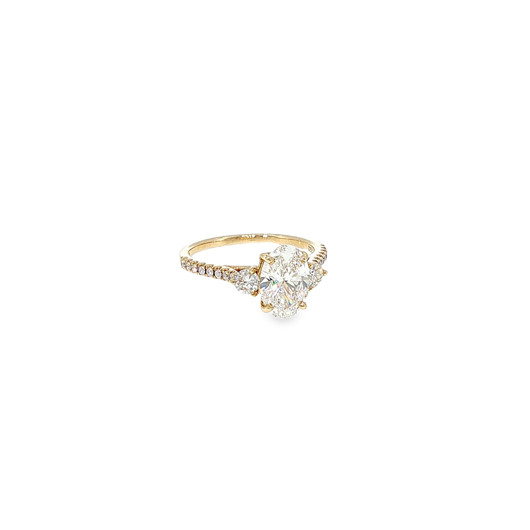 14K yellow gold engagement ring with an oval lab-grown diamond center and natural round diamond accents.
