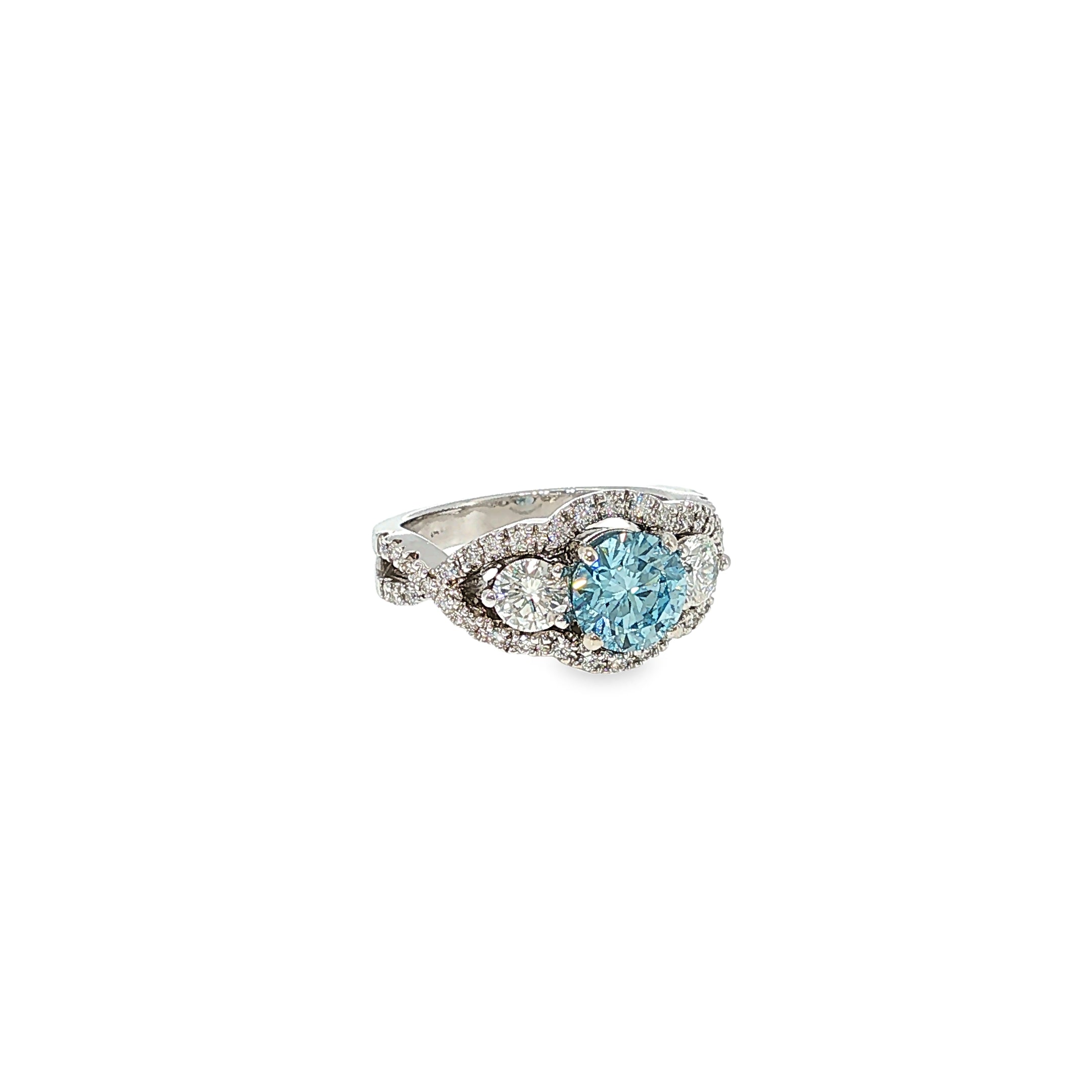 14K white gold three-stone ring with a fancy blue round lab-grown diamond center and natural diamond accents.