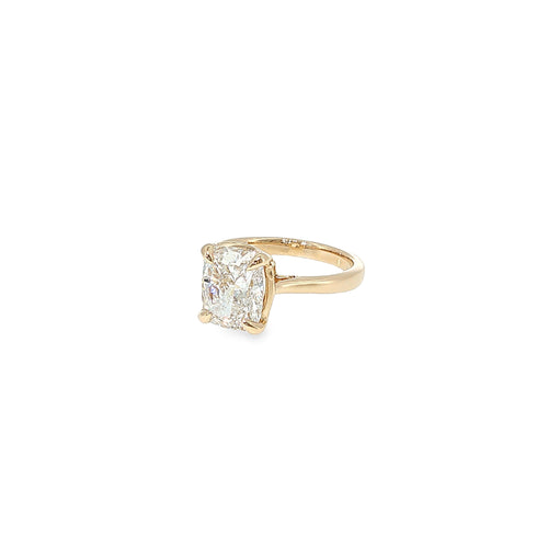 14K yellow gold solitaire engagement ring with a cushion-cut lab-grown diamond center.