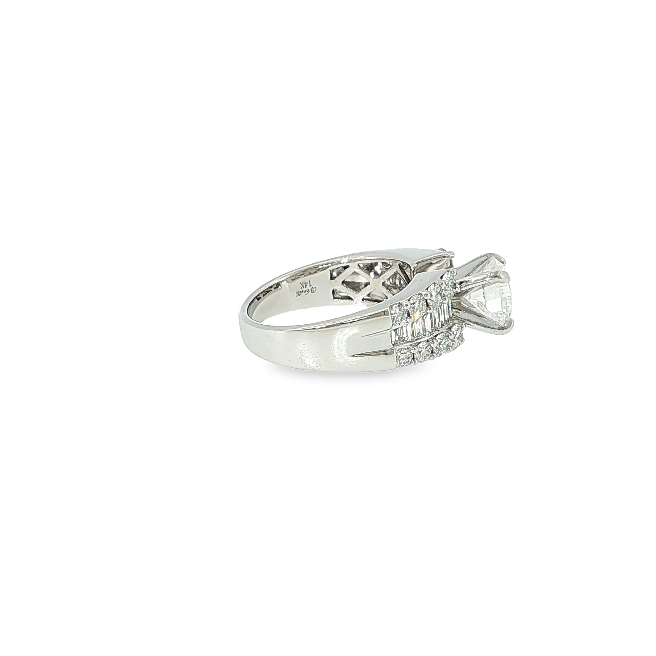 14K white gold engagement ring with a round brilliant diamond center and multiple rows of baguette and round diamonds.