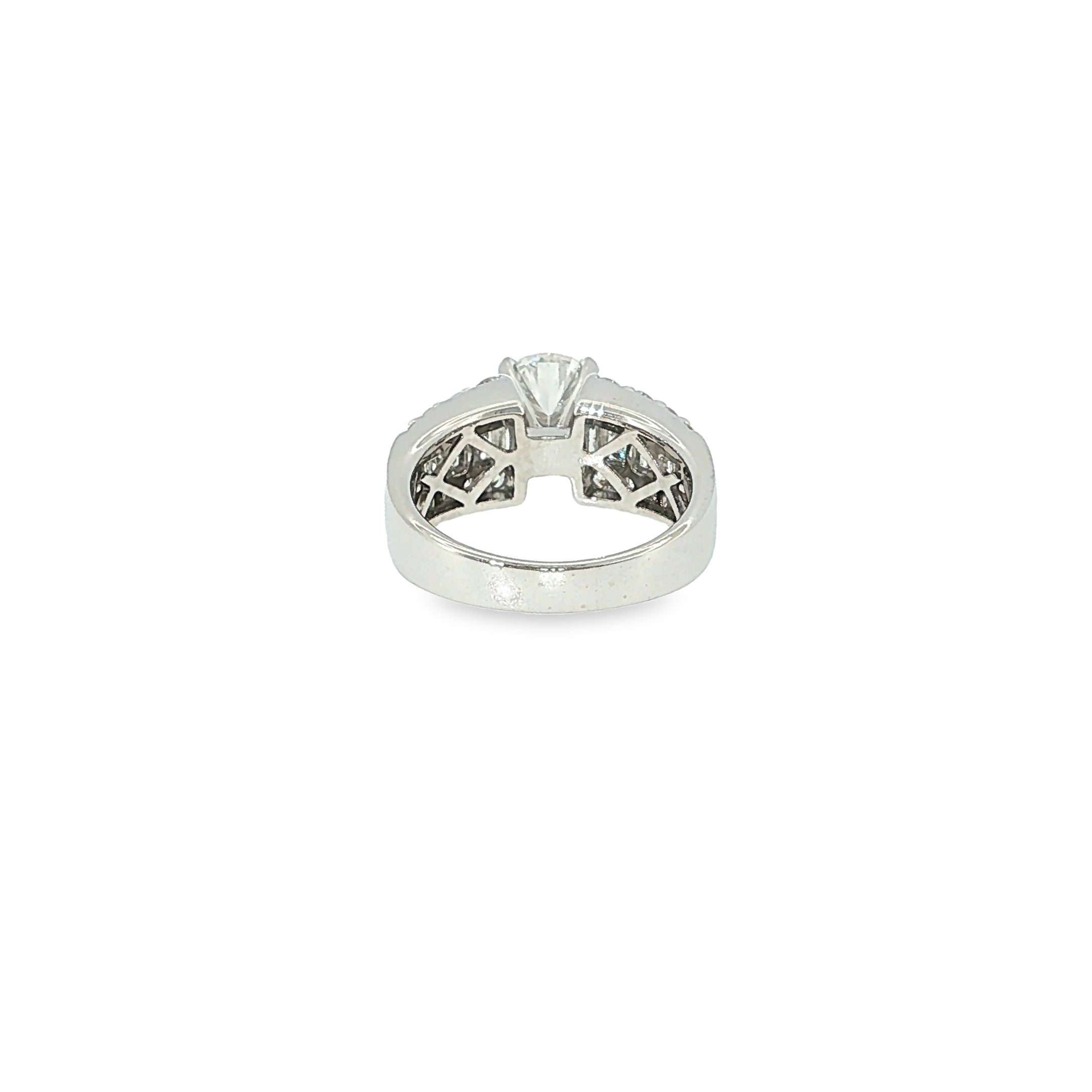 14K white gold engagement ring with a round brilliant diamond center and multiple rows of baguette and round diamonds.