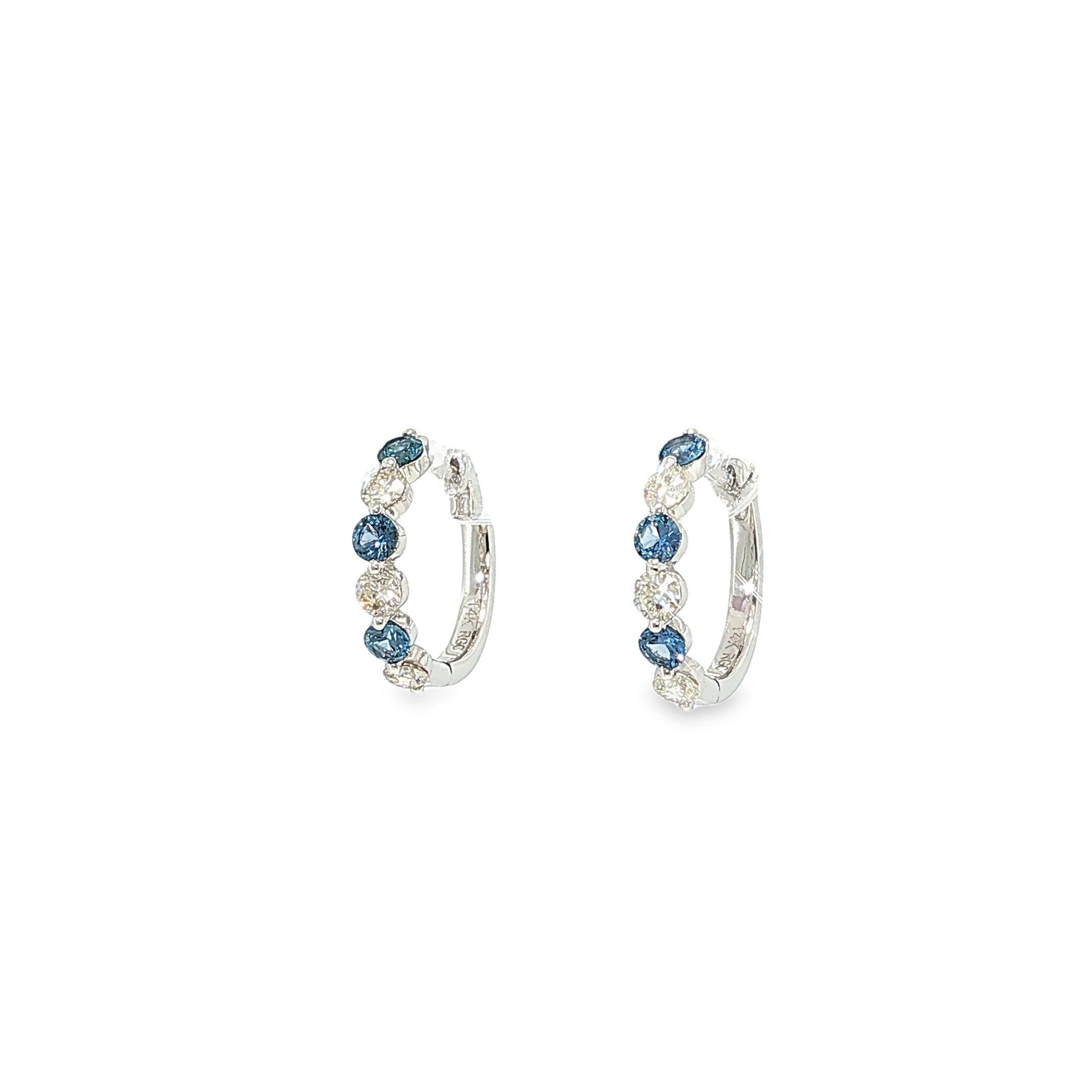 14K white gold hoop earrings with alternating Montana Yogo sapphires and round brilliant diamonds.