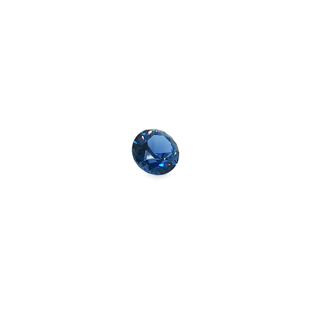 Loose round brilliant-cut natural blue Montana Yogo sapphire gemstone.