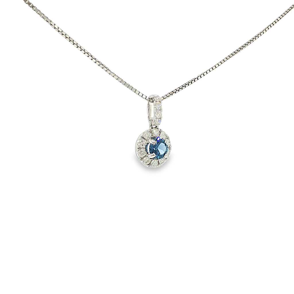 14K white gold pendant with a Montana Yogo sapphire surrounded by a diamond halo and diamond-accented bail.
