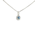 14K white gold pendant with a Montana Yogo sapphire surrounded by a diamond halo and diamond-accented bail.