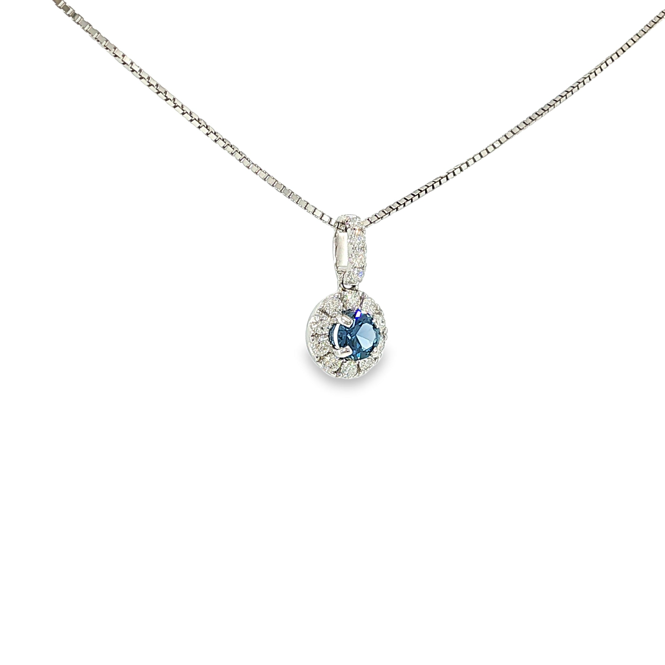 14K white gold pendant with a Montana Yogo sapphire surrounded by a diamond halo and diamond-accented bail.