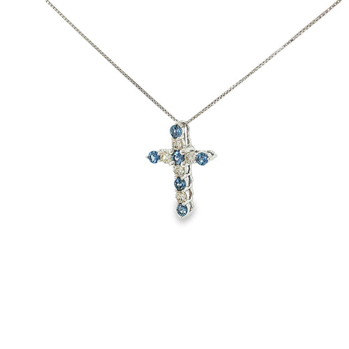14K white gold cross necklace with alternating blue Montana Yogo sapphires and diamonds.