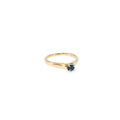 14K yellow gold cathedral solitaire ring with a round Montana Yogo sapphire center.