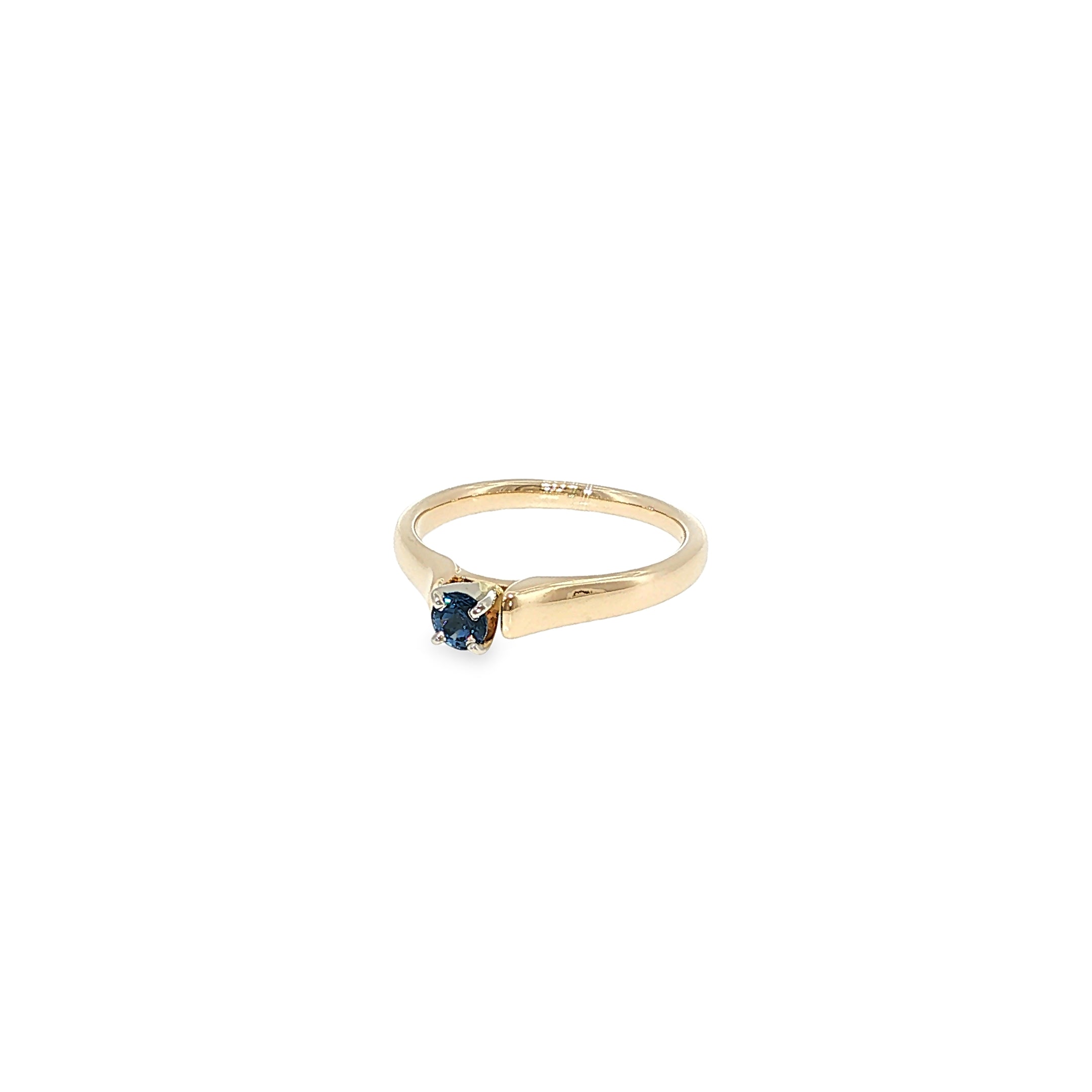 14K yellow gold cathedral solitaire ring with a round Montana Yogo sapphire center.