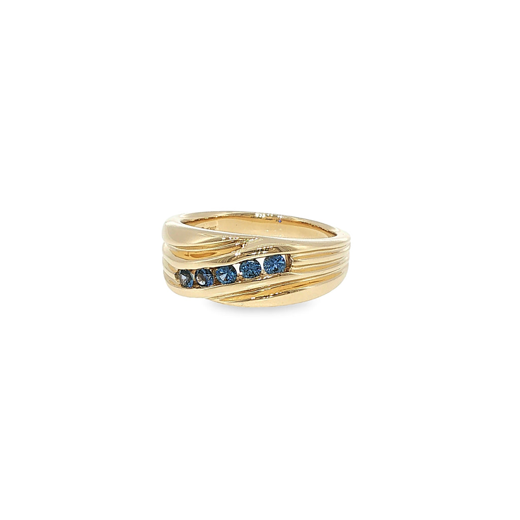 14K yellow gold men's ring with five channel-set round Montana Yogo sapphires and sculpted diagonal detailing.