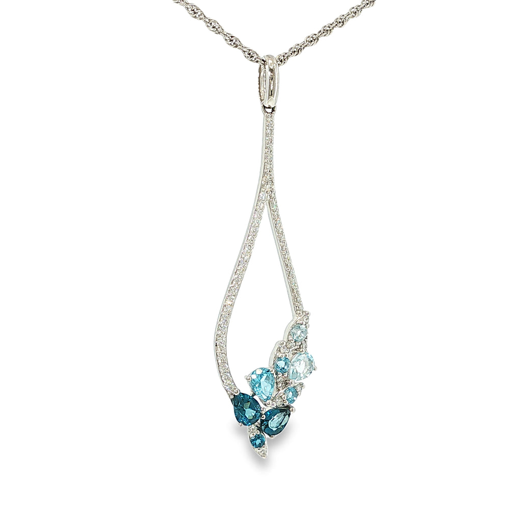 14K white gold pear-shaped necklace with mixed blue topaz gemstones and diamond accents, shown angled to the left.
