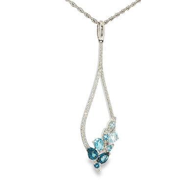 14K white gold pear-shaped necklace with mixed blue topaz gemstones and diamond accents, shown angled to the left.