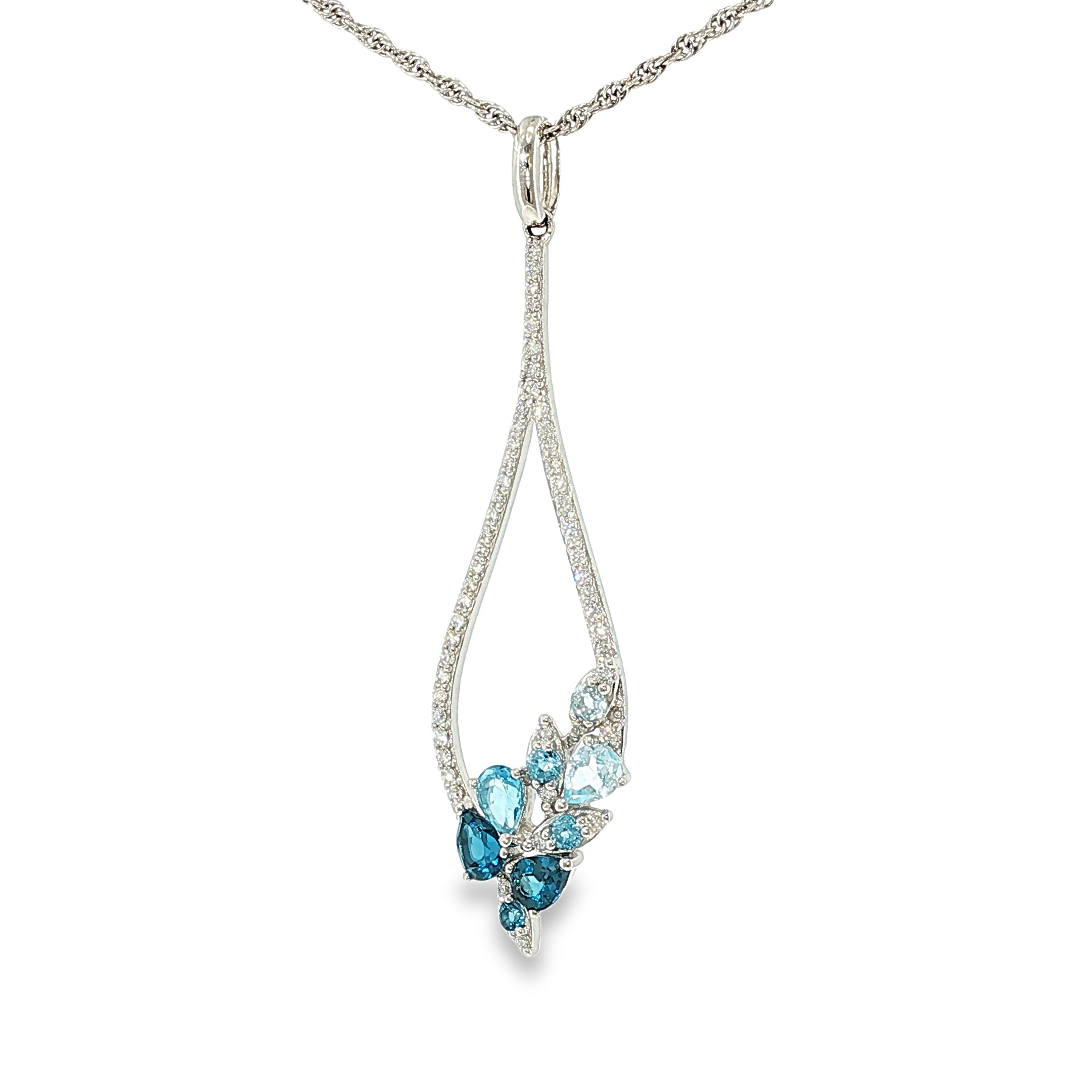 14K white gold pear-shaped necklace with mixed blue topaz gemstones and diamond accents, shown angled to the right.
