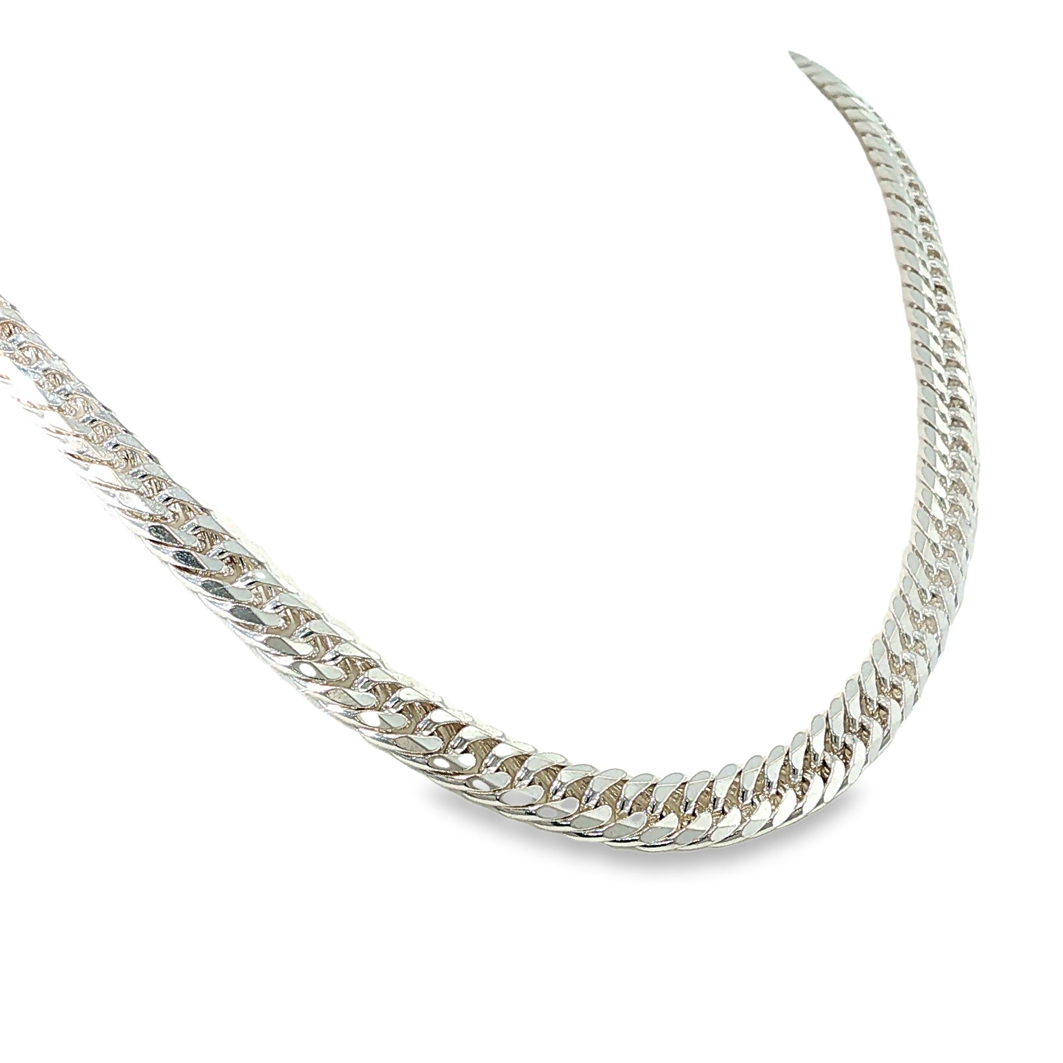 Sterling silver curb chain necklace with double diamond-cut detailing, shown angled to the right.