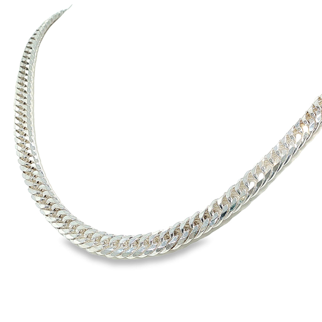 Sterling silver curb chain necklace with double diamond-cut detailing, shown angled to the left.