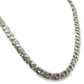 Sterling silver curb chain necklace with diamond-cut detailing and broad polished links, shown angled to the right.