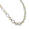 Sterling silver and 18K yellow gold necklace with alternating twisted and polished multi-shape links, shown angled to the right.