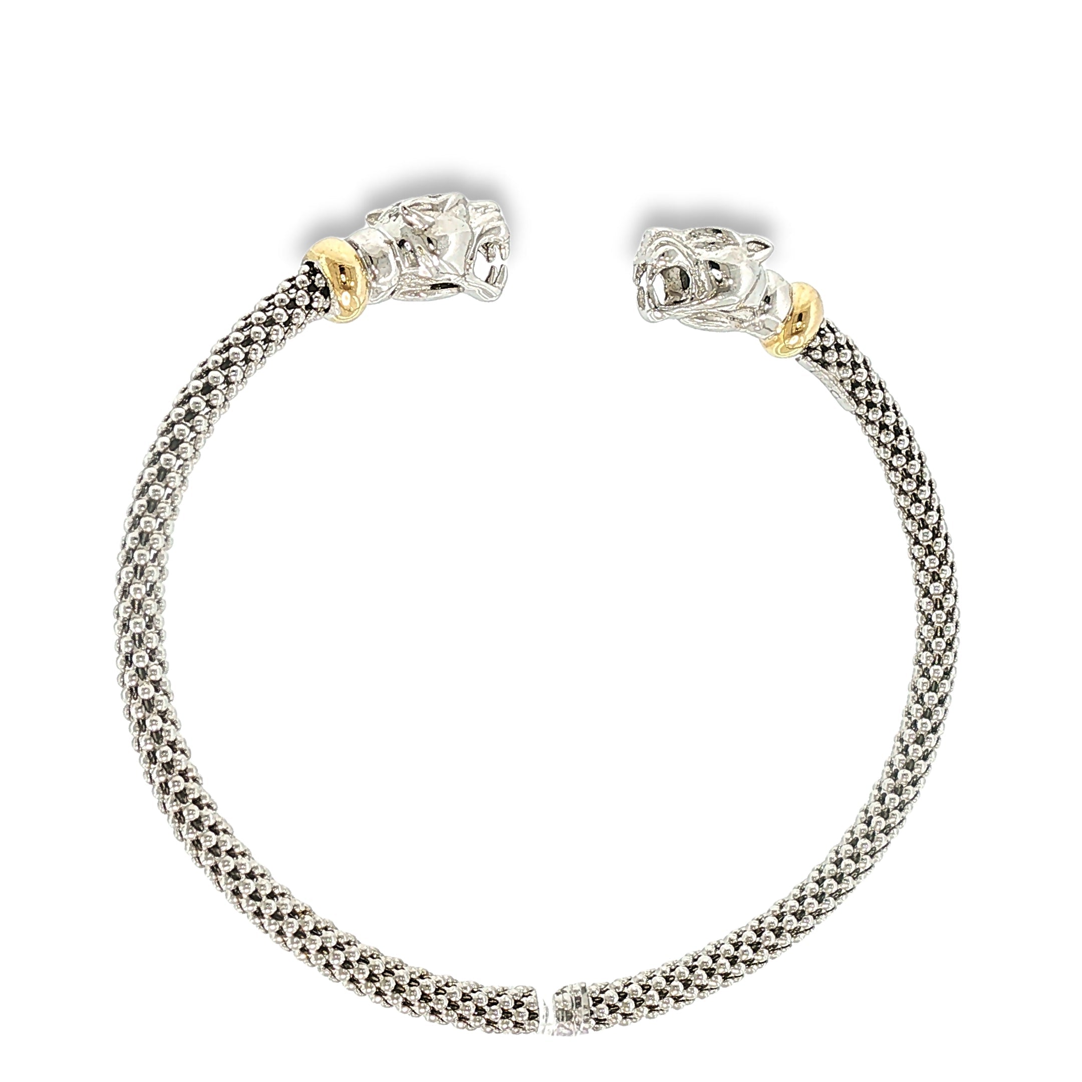 Woven sterling silver cuff bracelet with sculpted panther heads, diamond accents, and 18K yellow gold details, shown angled to the right.