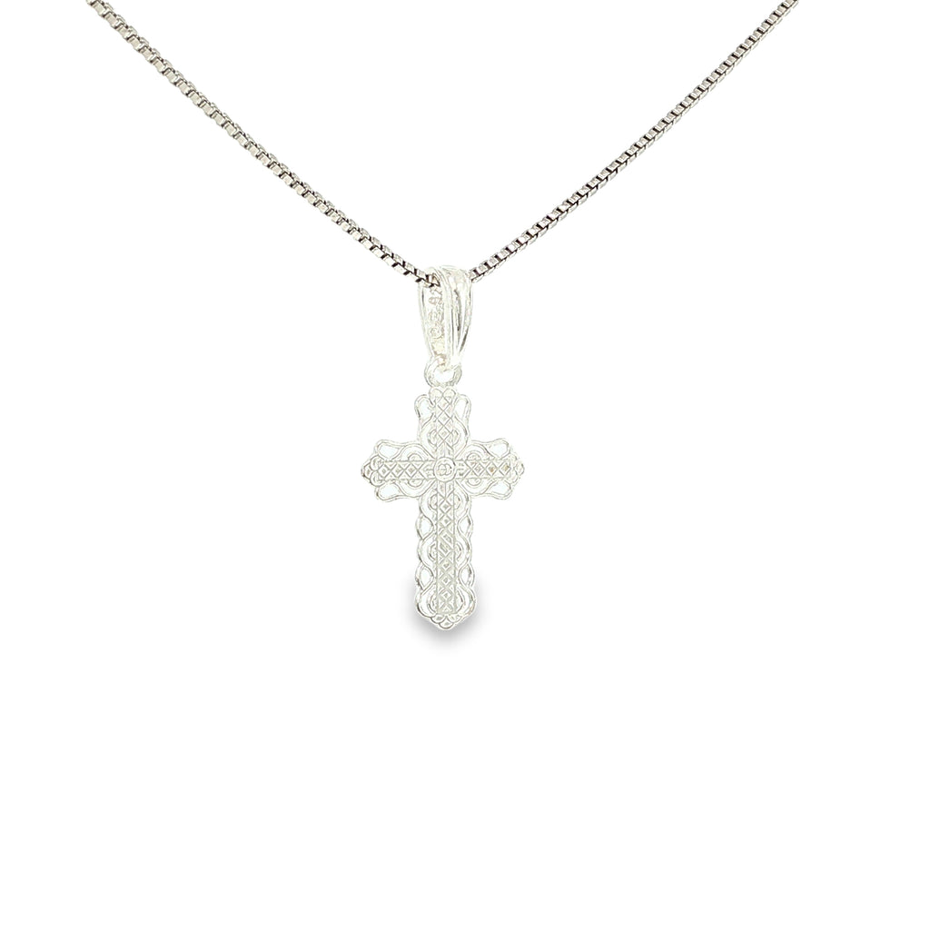 Sterling silver cross pendant with intricate lace-like textured detailing.