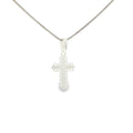 Sterling silver cross pendant with intricate lace-like textured detailing.