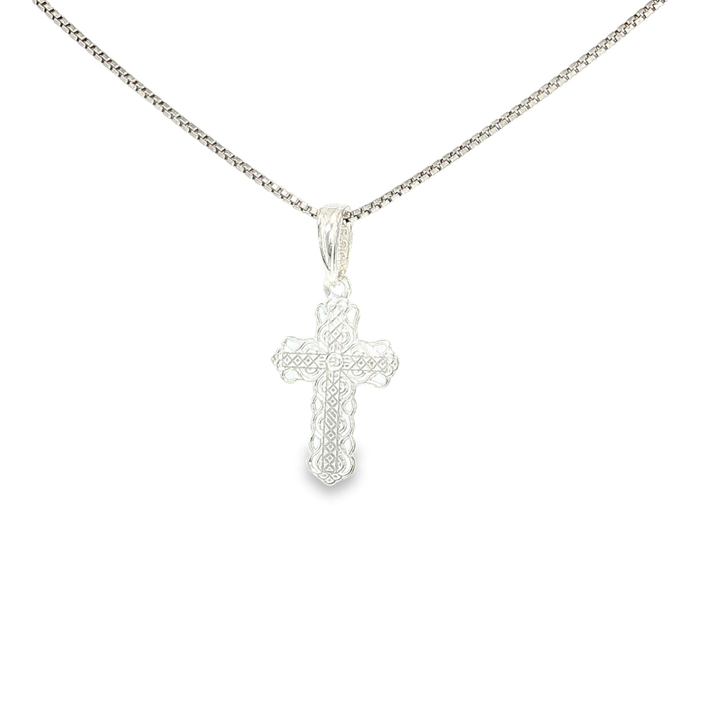 Sterling silver cross pendant with intricate lace-like textured detailing.
