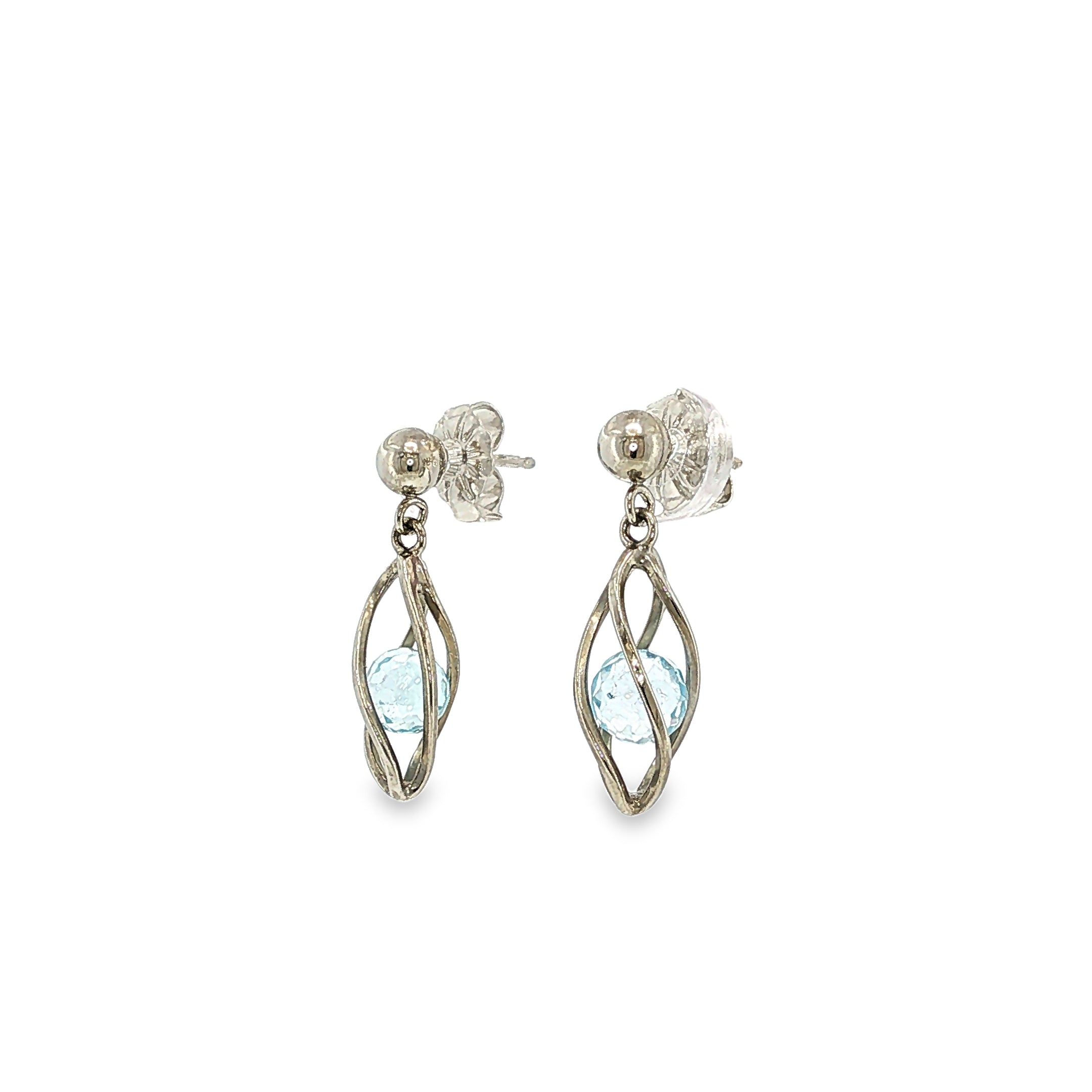 Sterling silver drop earrings with marquise blue topaz gemstones suspended inside open-cage designs.