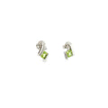 Sterling silver stud earrings with cushion-cut green peridots framed by curved silver and diamond accents.