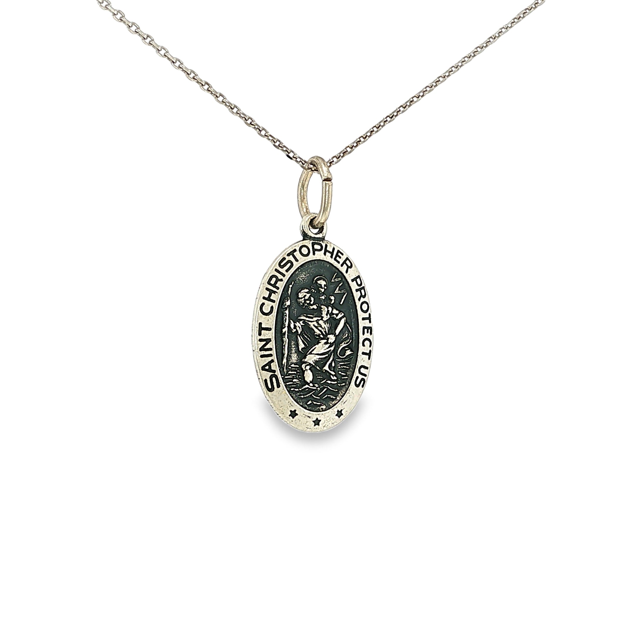 Sterling silver oval Saint Christopher medal pendant with raised religious detailing.