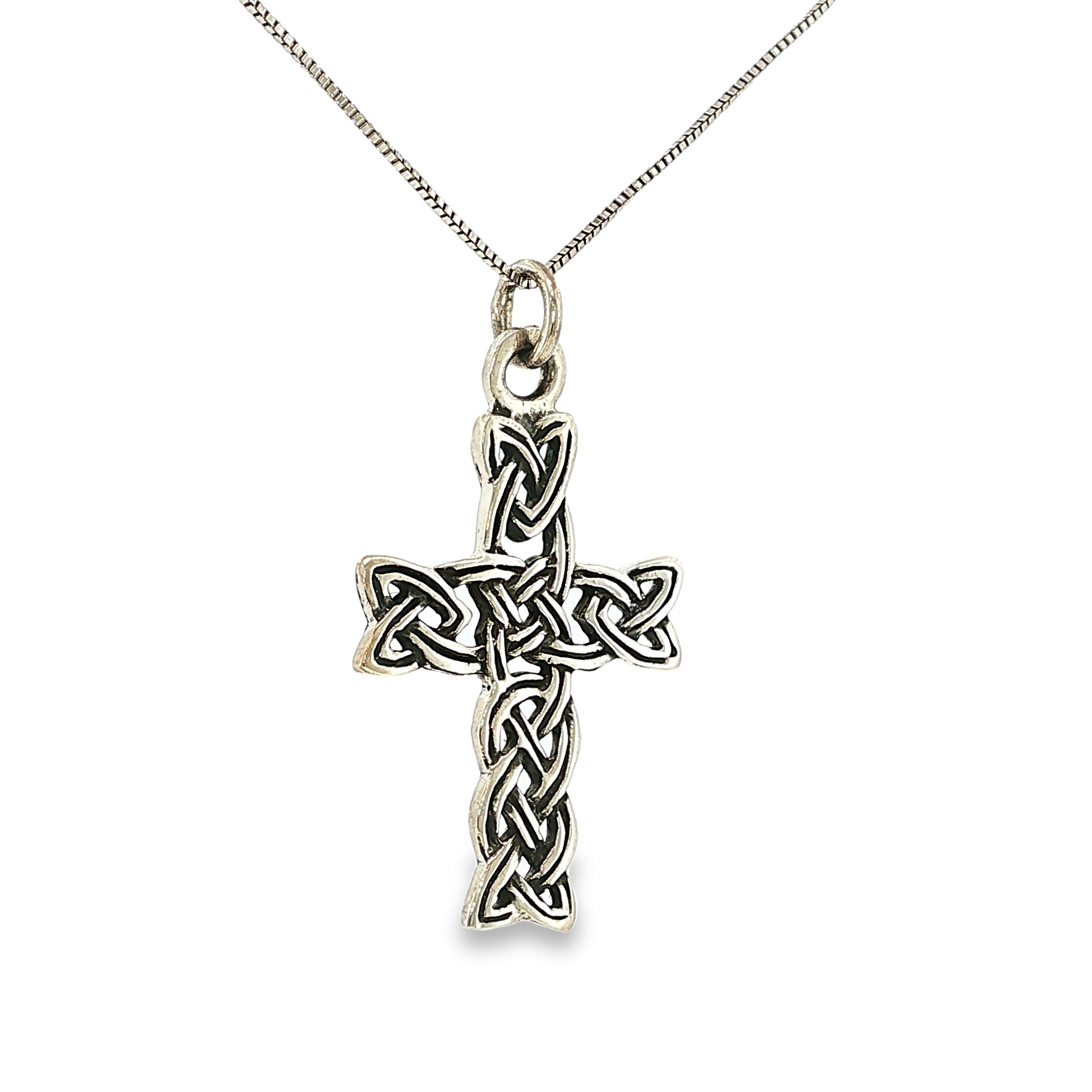 Sterling silver cross pendant with an antiqued finish and intricate Celtic knot detailing.