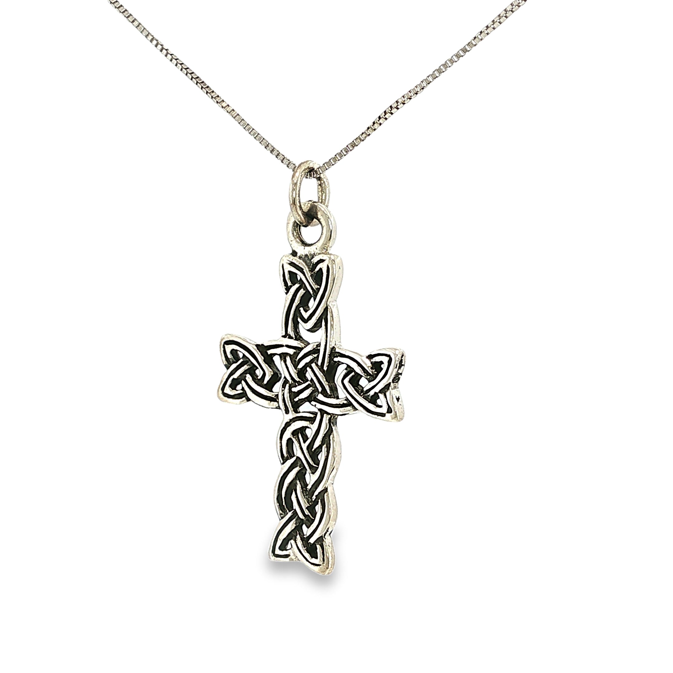Sterling silver cross pendant with an antiqued finish and intricate Celtic knot detailing.
