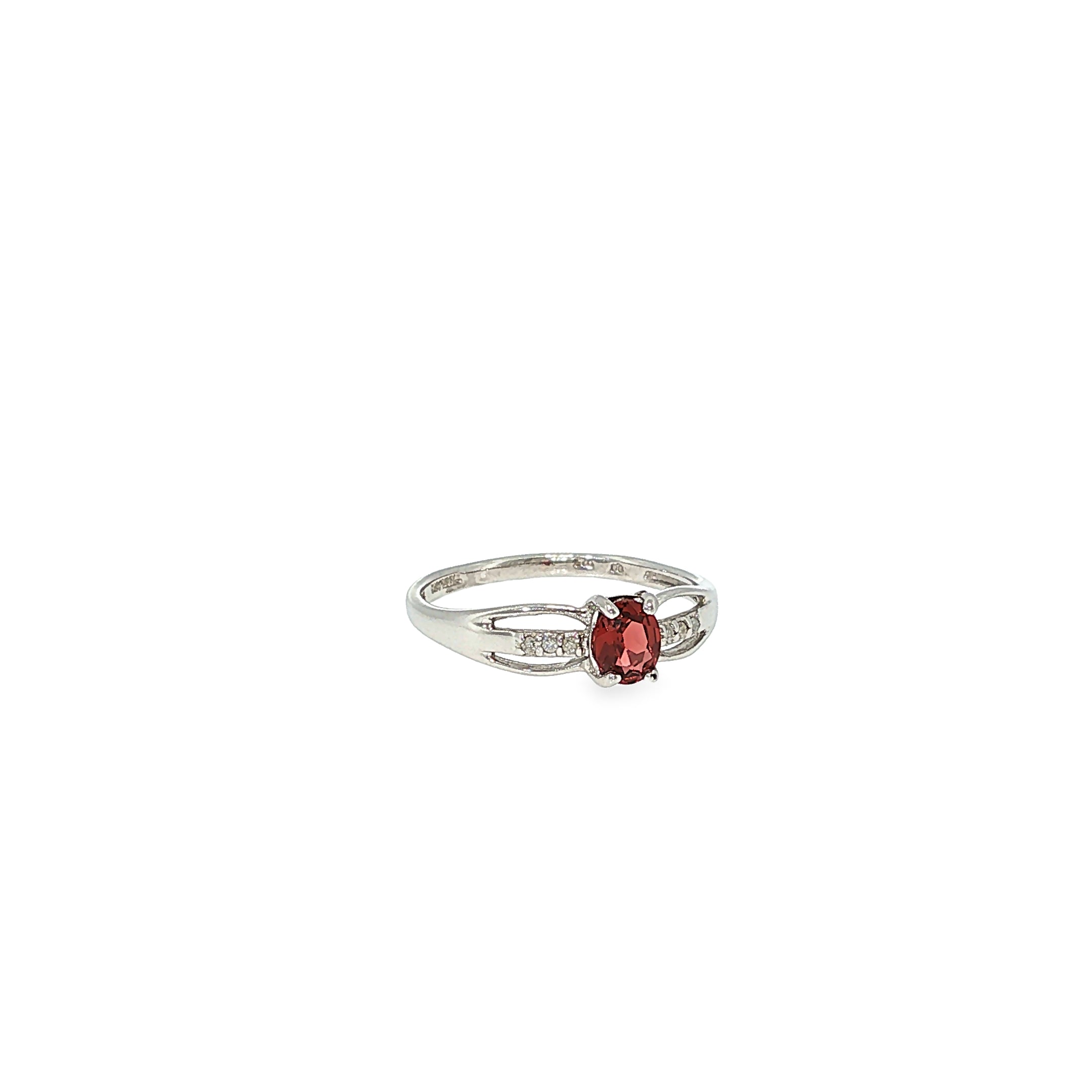 Sterling silver ring with an oval red garnet center, diamond accents, and a split-shank design.
