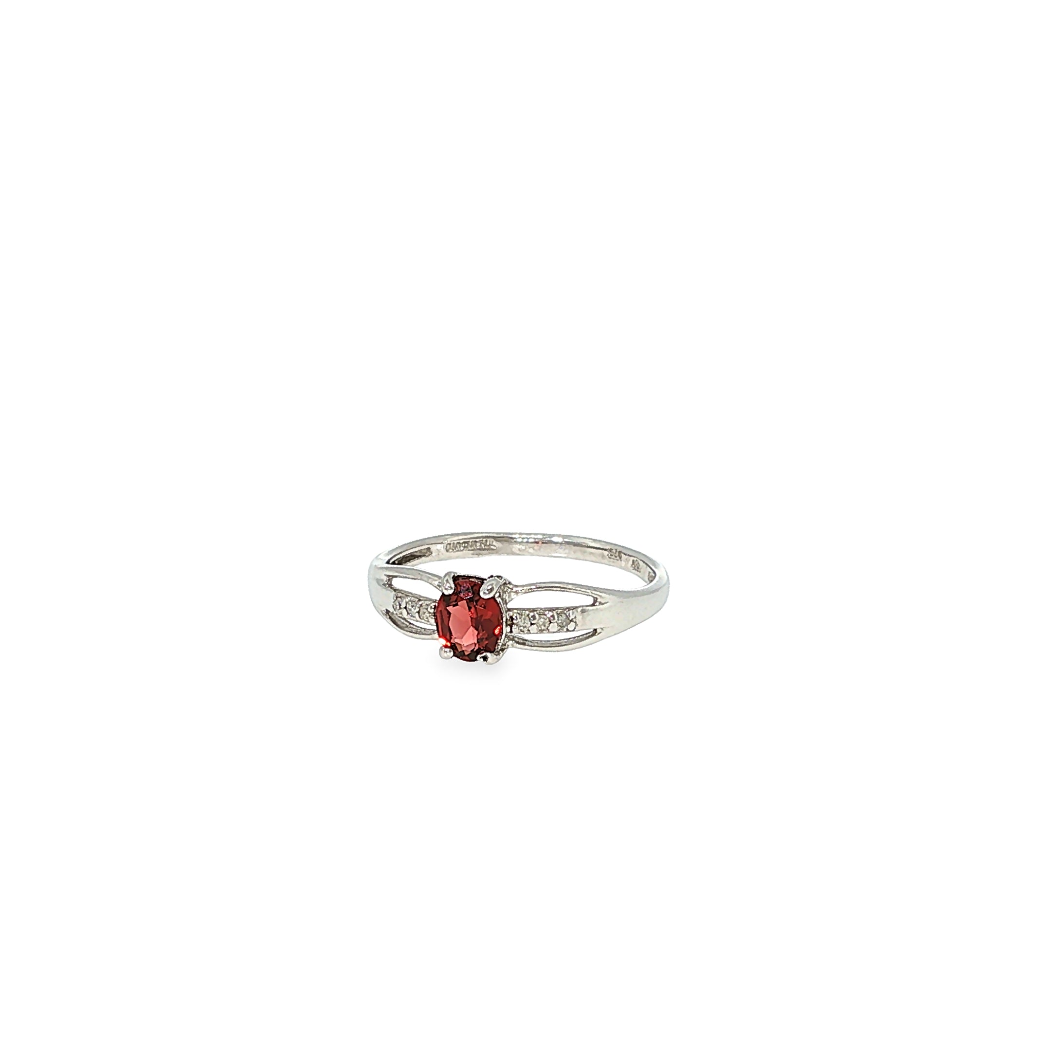 Sterling silver ring with an oval red garnet center, diamond accents, and a split-shank design.