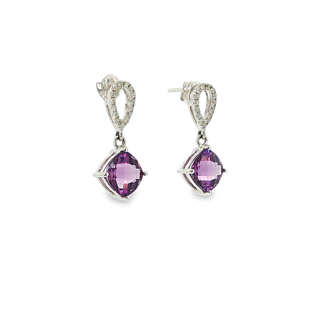14K white gold amethyst and diamond drop earrings with two faceted purple amethysts and diamond-accented tops.