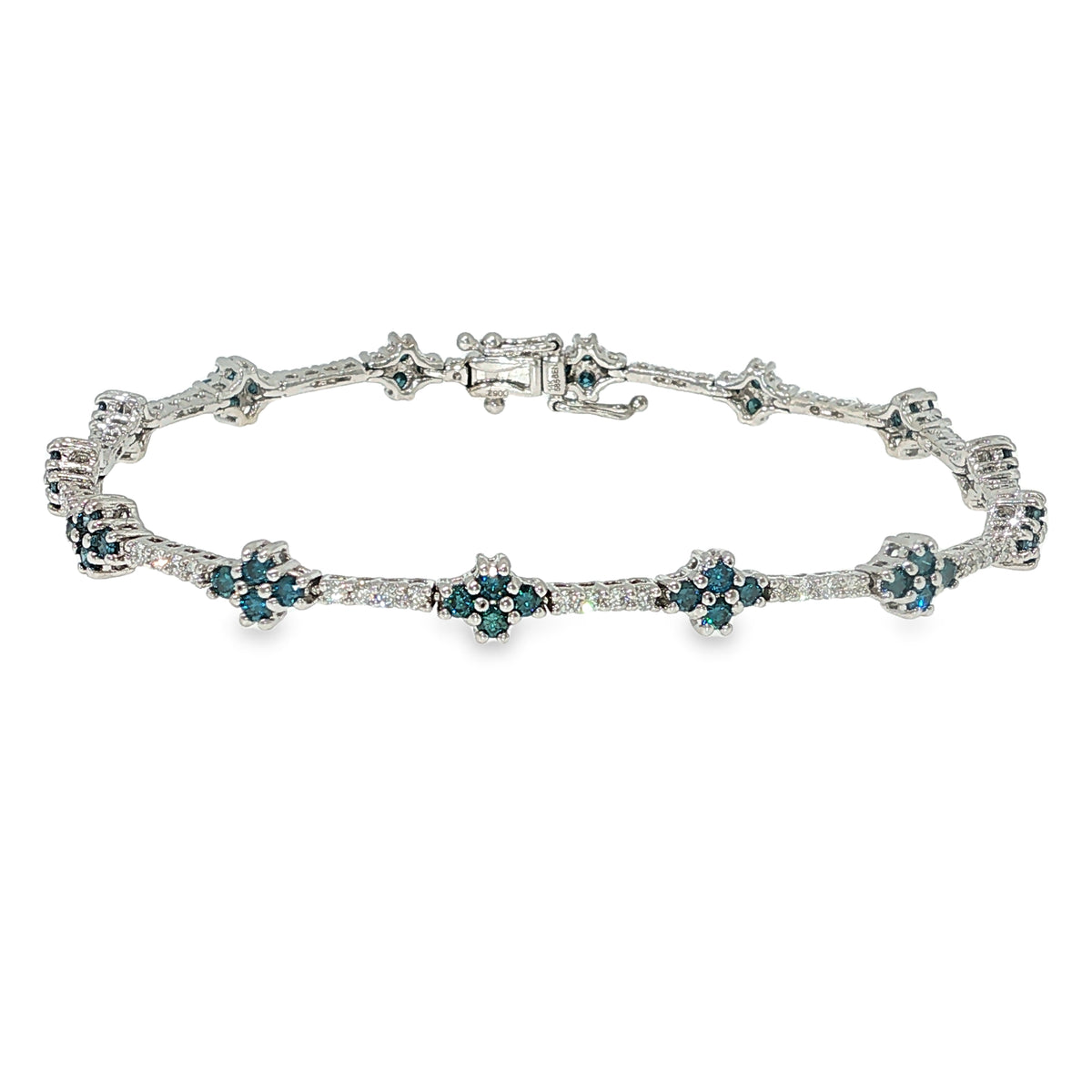 Blue and white diamond floral bracelet in 14K white gold with clustered flower-style diamond accents.