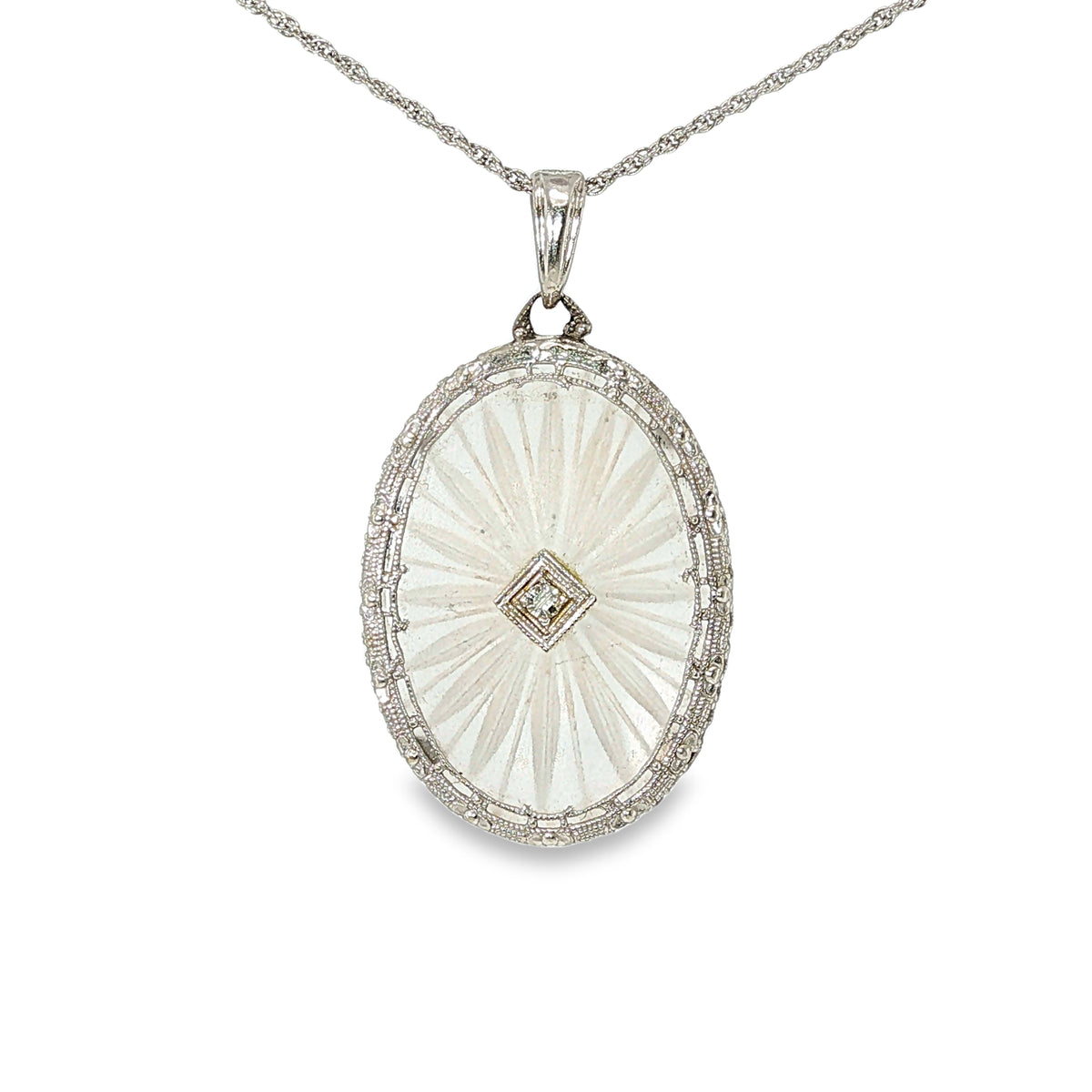 Vintage-style oval crystal pendant necklace with a centered old mine-cut diamond, filigree detailing, and 18-inch white gold rope chain.