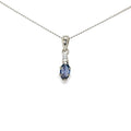 14K white gold pendant with a marquise Montana Yogo sapphire and single diamond accent.