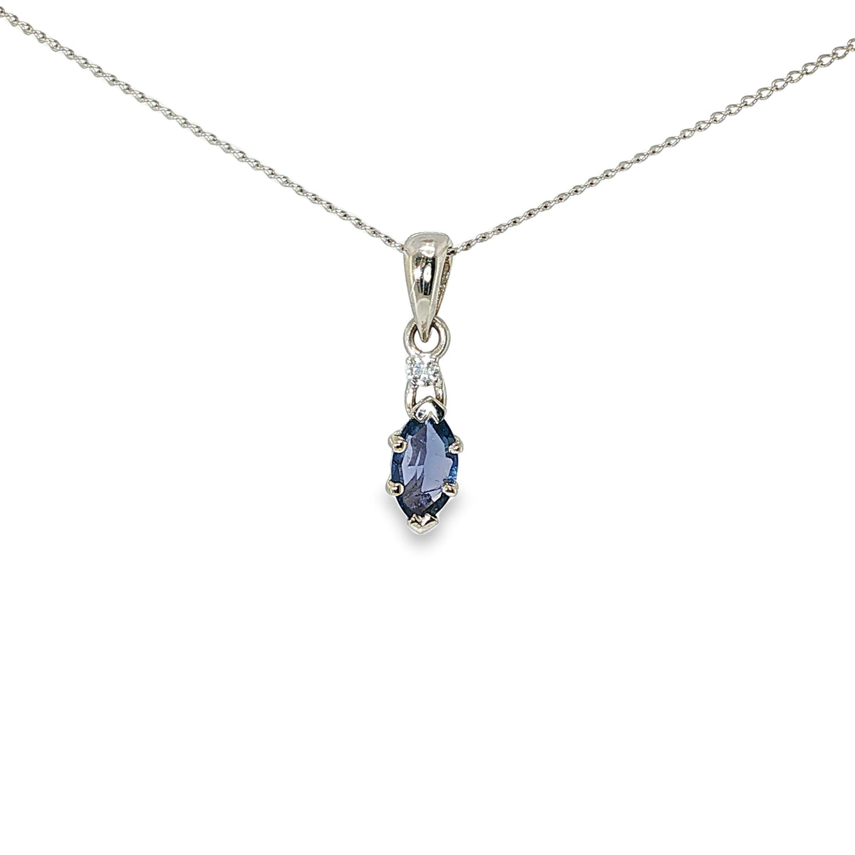 14K white gold pendant with a marquise Montana Yogo sapphire and single diamond accent.