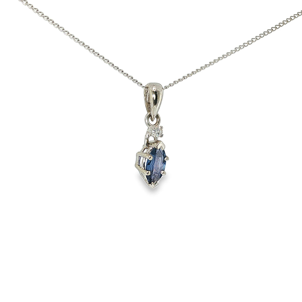 14K white gold pendant with a marquise Montana Yogo sapphire and single diamond accent.