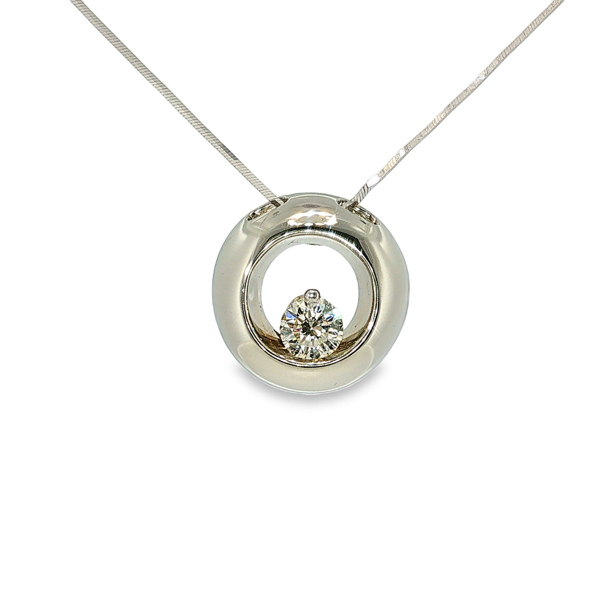 18K white gold open-circle pendant with a round brilliant diamond suspended at the center.
