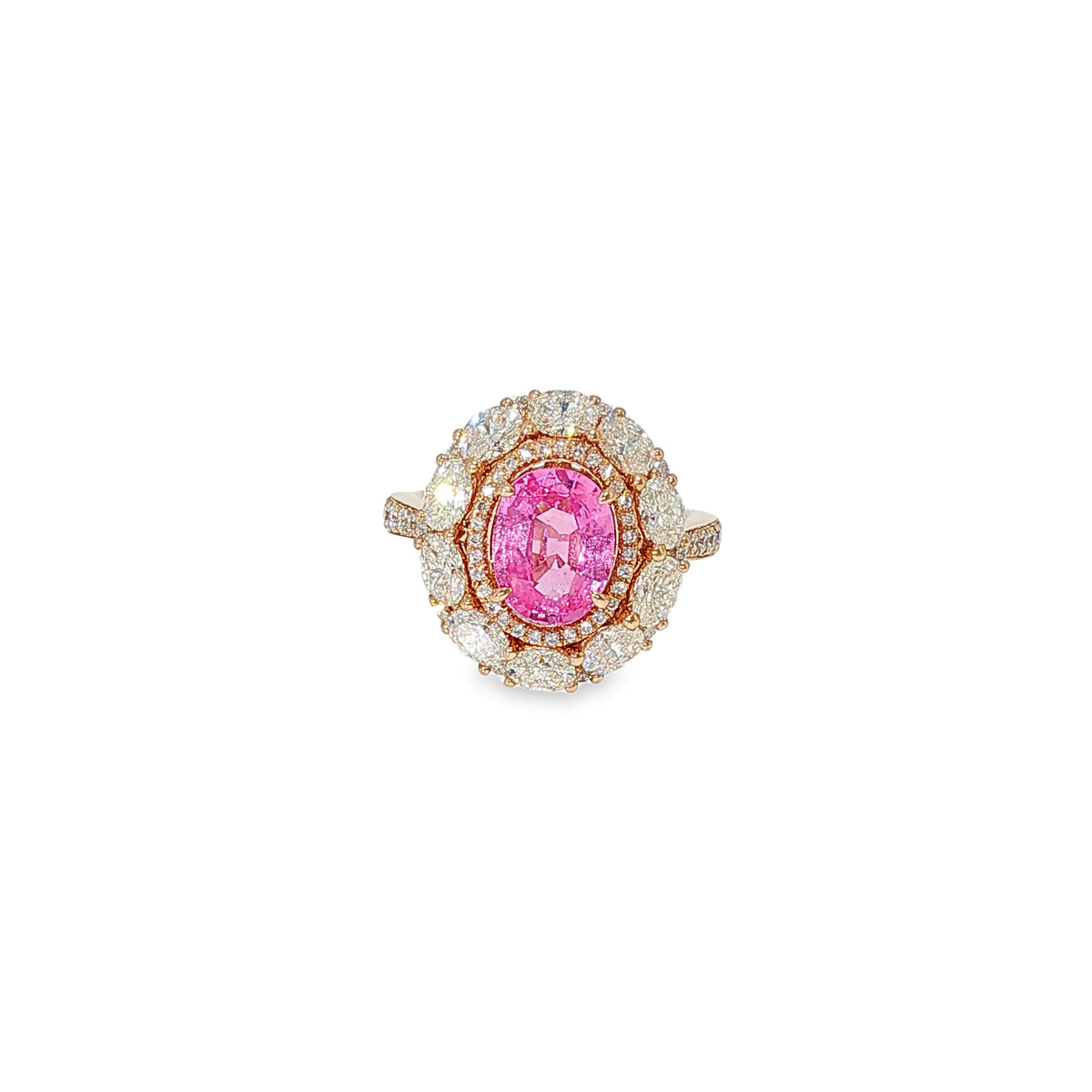 18K rose gold oval pink sapphire ring with a double halo of oval and round diamonds.